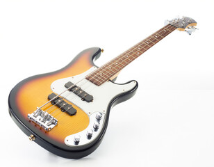 Fototapeta premium Electric bass guitar with a sunburst finish, a classic instrument for music production and performance