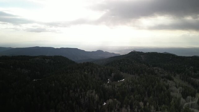 Aerial from Cloudcroft New Mexico Sacramento Mountains with stormy sky in spring