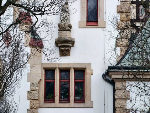 Gothic stone architecture. Architectural details on Gothic stone exteriors showcase craftsmanship