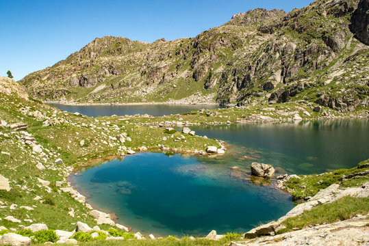 Lake view in the Saboredo cirque hiking trail, Aiguestortes and Estany de Sant Maurici national park, Lleida province, Catalonia, Spain