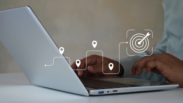 Businessman planning overall goals and direction of the strategy. Project Roadmap Concept. Digital interface on computer with roadmap overlay representing steps in project strategic planning process.