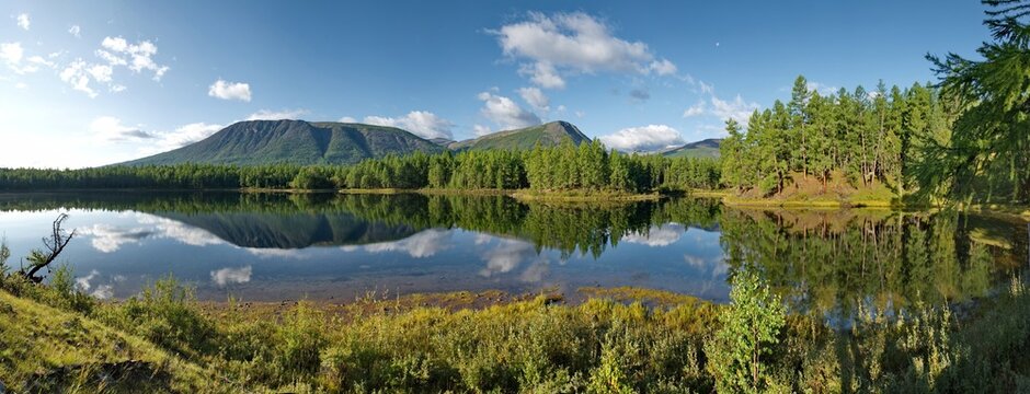 Russia, Western Buryatia. Early morning on the deserted taiga lake Guzen-Nur, hidden from prying eyes, on the left bank of the Tisa River.