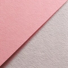 Fototapeta premium Gently overlapping planes of luxurious pink and understated grey felt fabric present a cozy and inviting textural background, ideal for textile artistry and warm design aestheticst