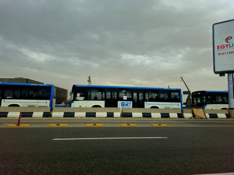 Cairo, Egypt, April 1 2026: Line of BRT Buses, The Bus Rapid Transit (BRT) project is implemented by the Ministry of Transport in the ring road highway, an alternative to microbus and metro 5th line