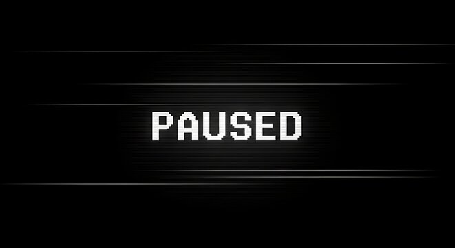 Paused digital interface text on dark background with interface typography lettering software.