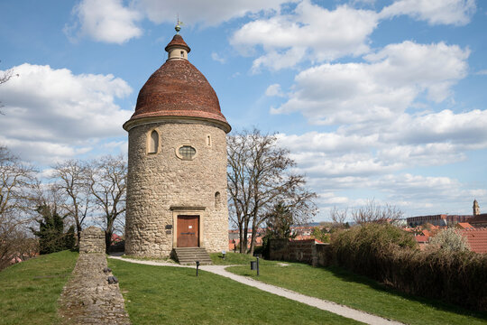 Detail of the historic Romanesque St. George Rotunda in Skalica, Slovakia, with a traditional tiled roofs in the background