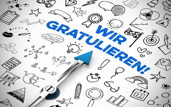 Kompass zeigt auf Schriftzug &bdquo;Wir gratulieren!&ldquo; zwischen Icons