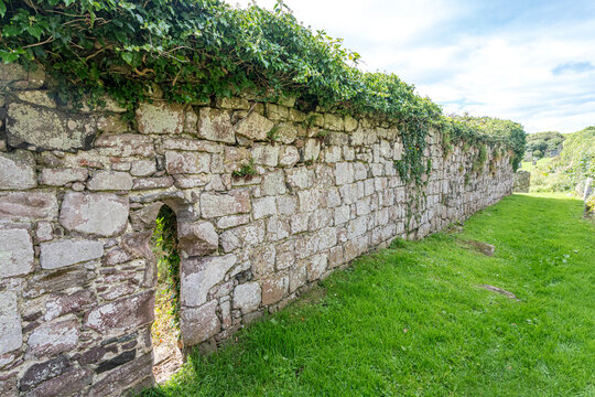 The exterior ruins of Saint Columba's Chapel in the cemetery at Keil, Dunaverty Bay near Southend on the Kintyre Peninsula, Argyll & Bute, Scotland UK