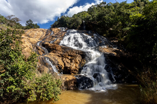 The impressive Phophonyane Falls, cascading down the ancient archaean gneiss, in the Piggs Peak region in North-western Eswatini.