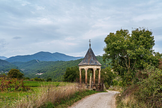 Walking to the covered cross, cruz cubierta in Ainsa, Huesca, Spain