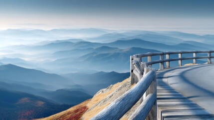 Fototapeta premium Serene Roadside Viewpoint with Wooden Railing Overlooking Mountain Range