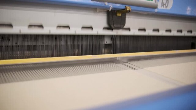  Modern Textile Factory with Workers, Fabric Production, Yarn Machines, and Solar-Powered Energy System,Industrial Textile Mill Showing Fabric Weaving, Yarn Processing, Factory Workers, and Renewable 