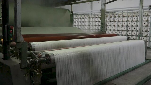  Modern Textile Factory with Workers, Fabric Production, Yarn Machines, and Solar-Powered Energy System,Industrial Textile Mill Showing Fabric Weaving, Yarn Processing, Factory Workers, and Renewable 