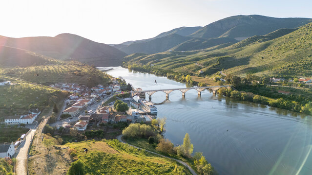 Douro river valley landscape with village and bridge
