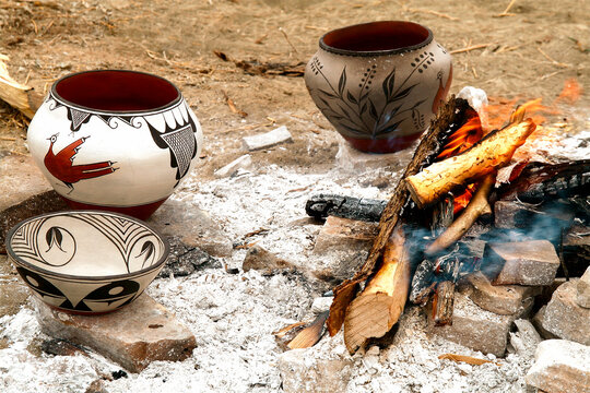 Traditional Pottery Near Campfire with Ash and Firewood Cultural Scene