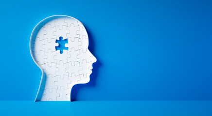 Head and brain diseases concept - missing piece of the brain puzzle on blue background with copy space