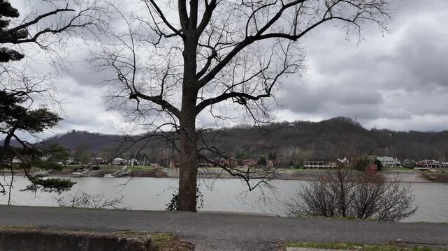Driving Along Kanawha River With Riverfront Properties Visible