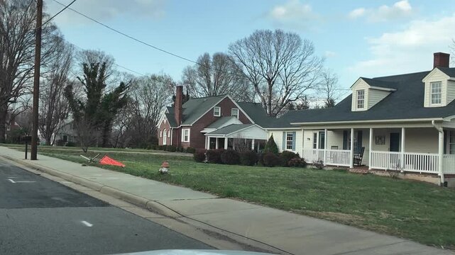 Driving Past Houses in a Small Town in North Carolina Near the Road