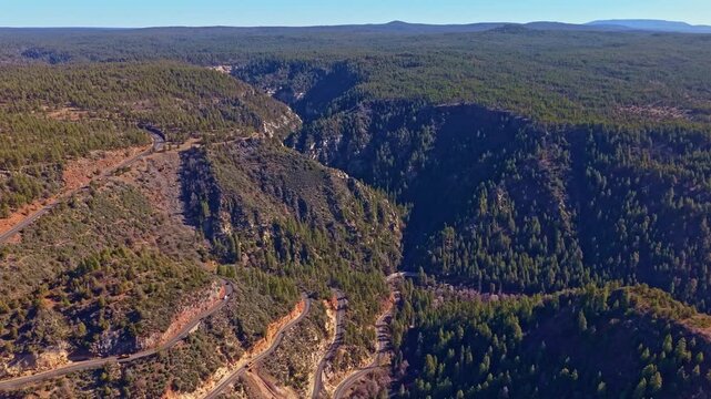 Winding switchback road of Arizona climbs through Oak Creek Canyon connecting Flagstaff and Sedona in Arizona