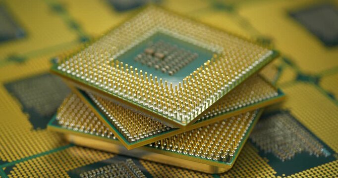 Central processing units with pins. Close-up of a central processing units. Central processing units for PC. Close view of CPU pins and contacts. CPU unit powering computer operations. Zoom-in video