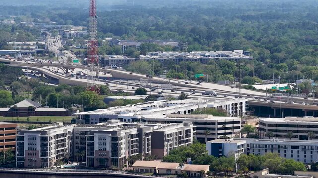 Aerial footage of cars driving on a highway in Jacksonville Florida USA