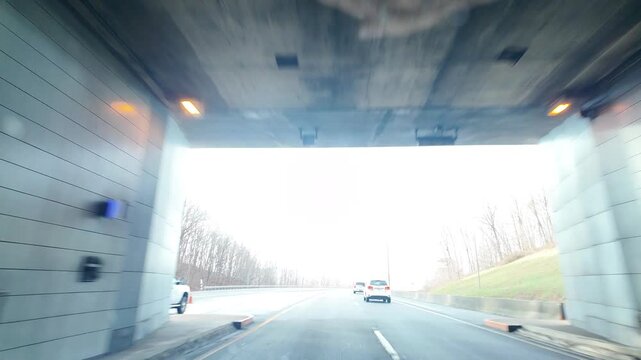 Driving Through a Mountain Tunnel Exit in West Virginia
