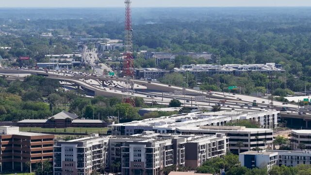 Aerial footage of cars driving on a highway in Jacksonville Florida USA