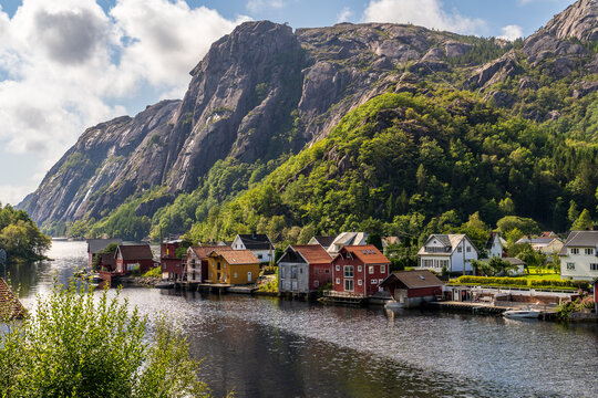 Colorful houses along the Sira River in &Aring;na-Sira village, Norway