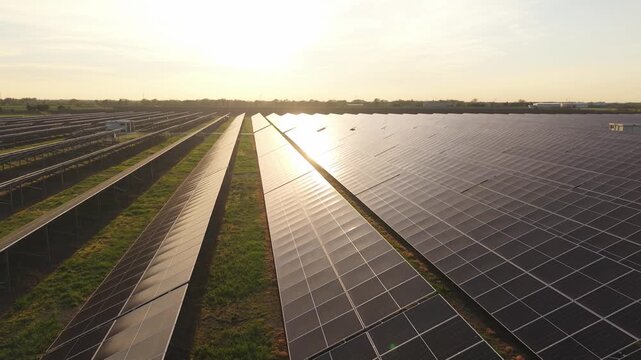 Solar Energy Plant Aerial Footage Photovoltaic Panels Rows at Dusk