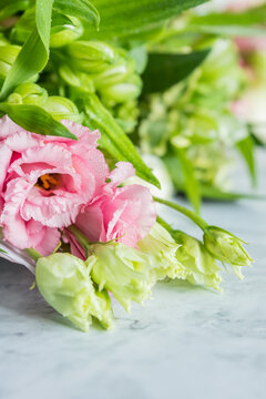 Celebrate special occasions with a colorful summer bouquet featuring fresh roses, eustoma blooms, creating an elegant and fragrant floral arrangement. love concept. copy space