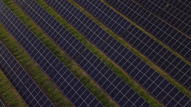 Drone View of Industrial Solar Power Plant Photovoltaic Panels Field
