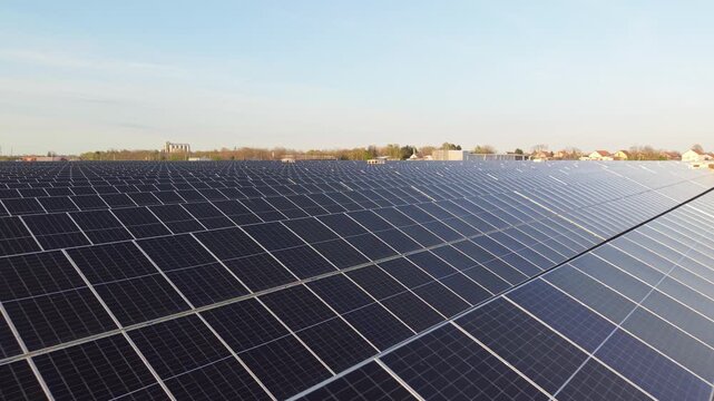 Drone Orbiting Solar Farm at Sunset Renewable Energy Aerial Footage