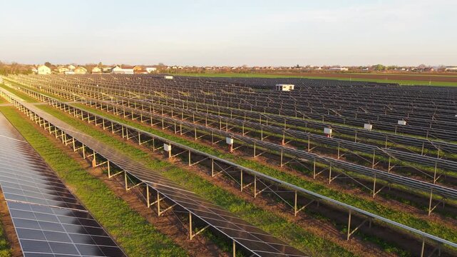 Vast Solar Panel Array in Open Field Drone Footage Renewable Power Station