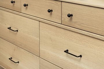 Neutral stain color on wooden white oak cabinetry with rift, plain and quarter sawn grain patterns 
