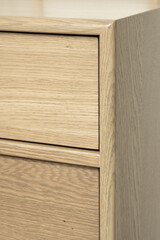 Neutral stain color on wooden white oak cabinetry with rift, plain and quarter sawn grain patterns 
