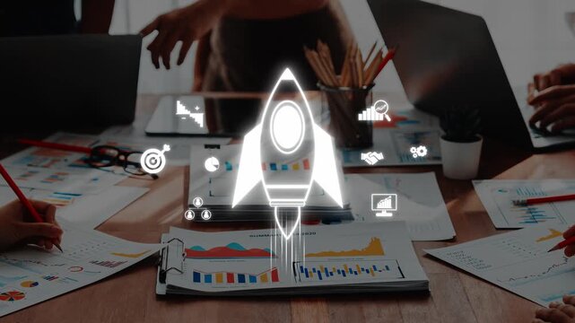 A dynamic teamwork scene showcasing professionals engaged in a collaborative session, surrounded by charts, data sheets, and a rocket symbolizing growth and innovation. Raster