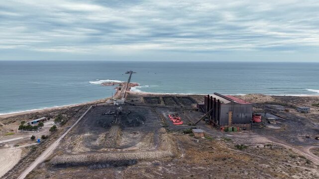 Aerial view of MCC Minera Sierra Grande port and industrial facilities in Punta Colorada.