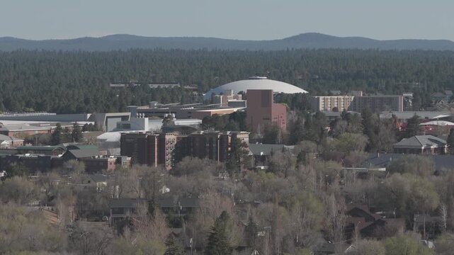 Aerial ascending over NAU campus in Flagstaff Arizona in spring time in Pro Res