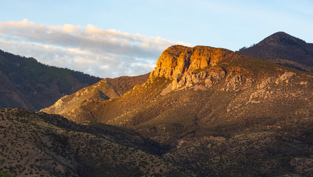 Morning sun just starting to light the ridges of the Huachuca Mountains in Arizona