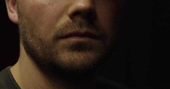 Half Lit Face of Man &ndash; Dramatic Light and Shadow Portrait