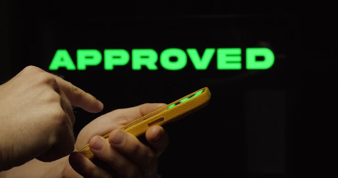 Smartphone Showing Approved Status &ndash; Successful Decision and Positive Result Concept