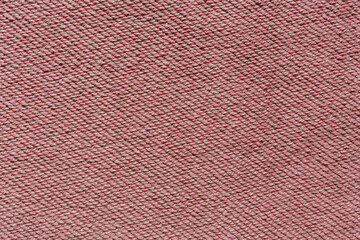 Fototapeta premium Muted pink french terry loopback fabric texture detailed textile background