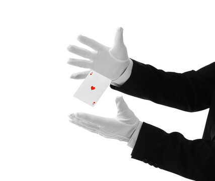 Male magician's hands with levitating playing card on white background