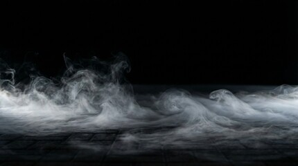 Cinematic low lying fog rolling across dark paved floor with moody lighting effect. © Oleraj Hossin