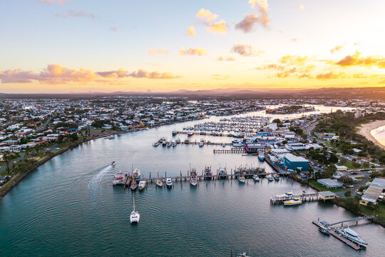 Golden Hour Aerial Panorama of Point Cartwright and Mooloolah River Estuary, with Marinas, Boats, and Coastal Landscape in Queensland