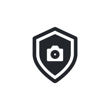 A simple icon featuring a camera inside a shield, suggesting secure photography or data privacy