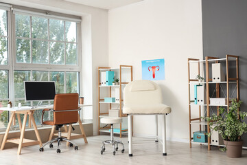Fototapeta premium Interior of gynecologist's office with workplace and couch