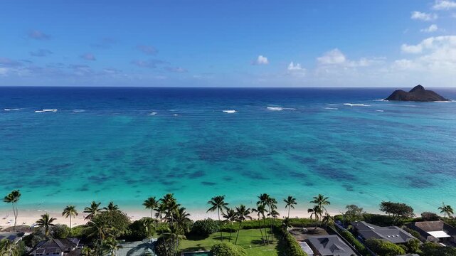 Beautiful view overlooking the coastline at Lani Kai Beach with Na Mokulua on the windward side of Oahu Island in Hawaii.