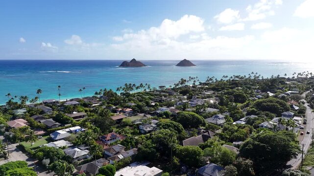 Na Mokulua aka Mokulua Islands or the Mokes off Lanikai Beach in Kailua town on the windward side of Oahu in the Hawaiian Islands. 