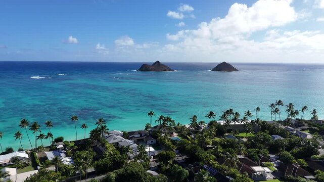 Na Mokulua aka Mokulua Islands or the Mokes off Lanikai Beach in Kailua town on the windward side of Oahu in the Hawaiian Islands. 